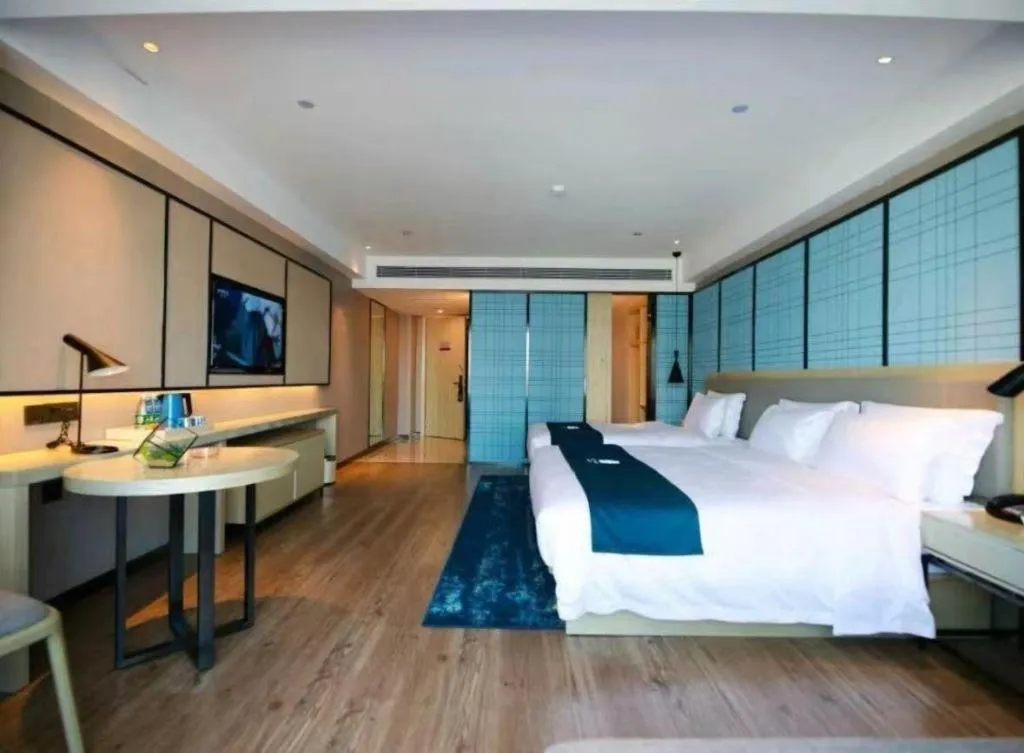 Bed in Echarm Hotel Changchun Jiutai District Government Railway Station