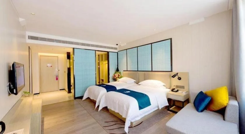 Bed in Echarm Hotel Changchun Jiutai District Government Railway Station