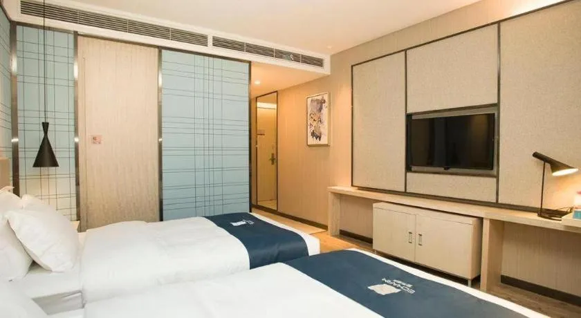 Bed in Echarm Hotel Changchun Jiutai District Government Railway Station