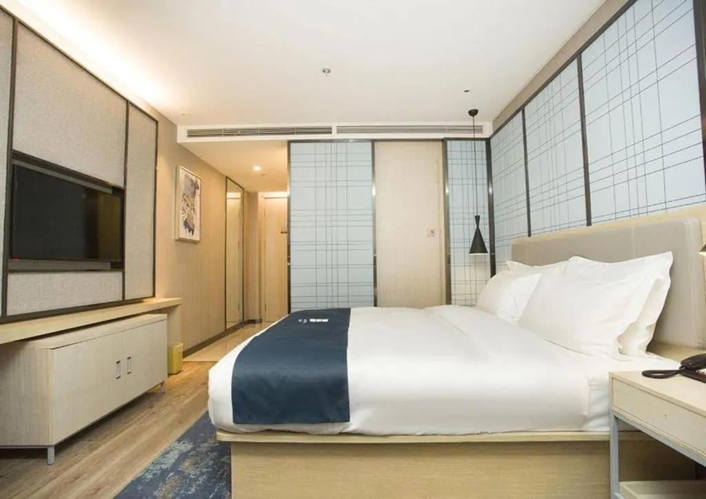 Bed in Echarm Hotel Changchun Jiutai District Government Railway Station