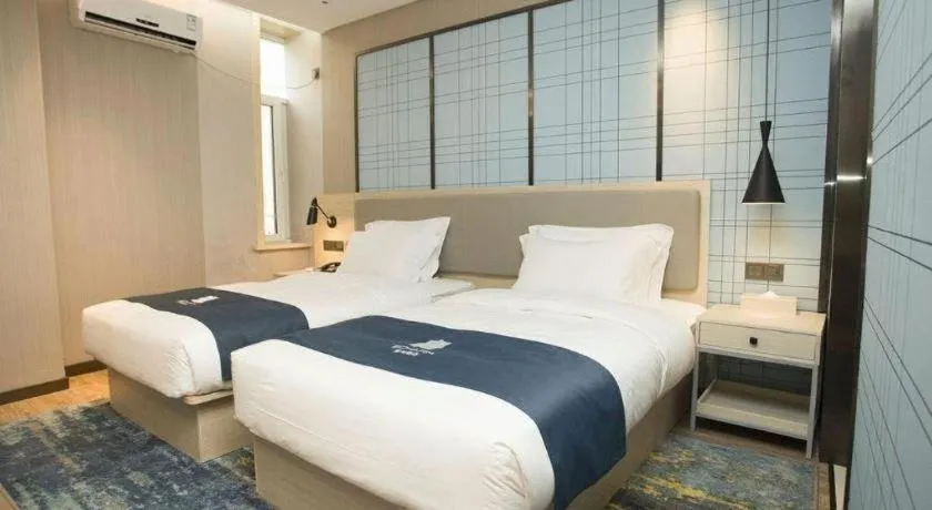 Bed in Echarm Hotel Changchun Jiutai District Government Railway Station
