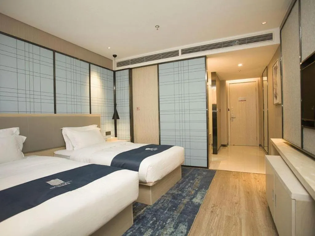 Bed in Echarm Hotel Changchun Jiutai District Government Railway Station