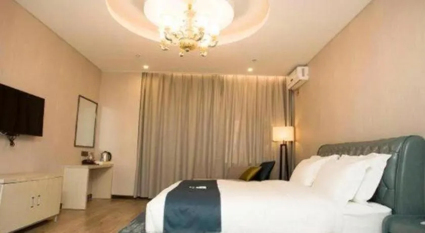 Bed in Echarm Hotel Changchun Jiutai District Government Railway Station