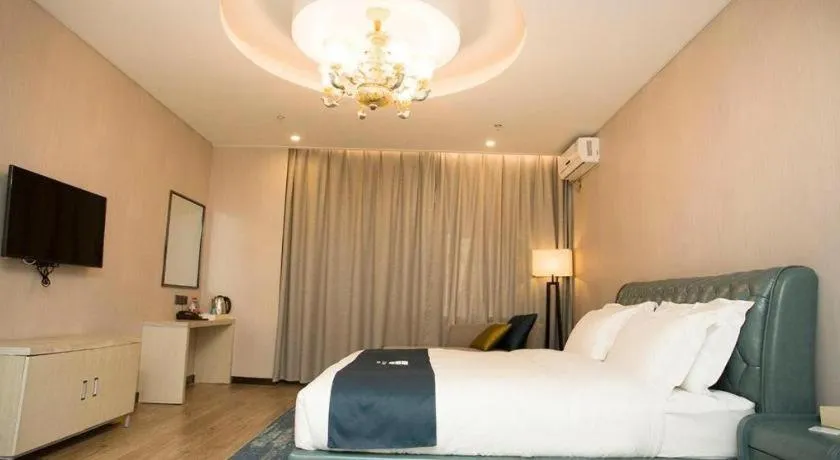 Bed in Echarm Hotel Changchun Jiutai District Government Railway Station