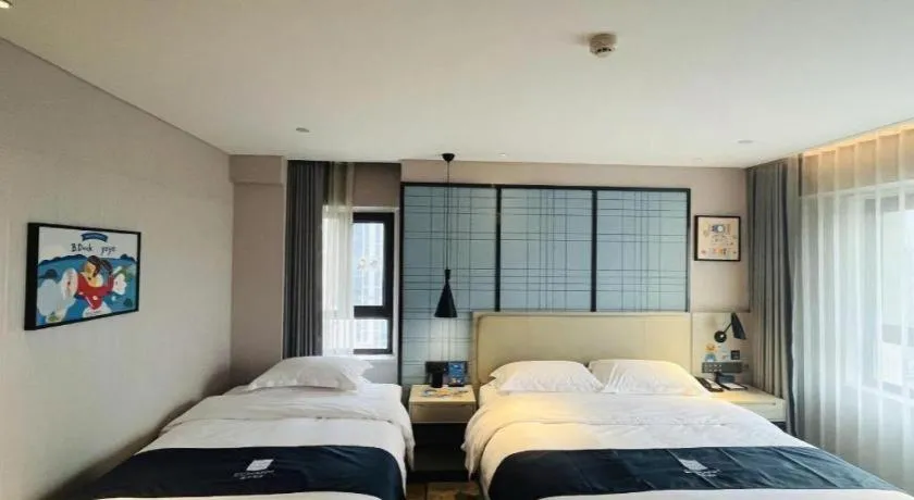 Bed in Echarm Hotel Changchun Jiutai District Government Railway Station