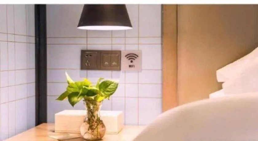 Bed in Echarm Hotel Changchun Jiutai District Government Railway Station