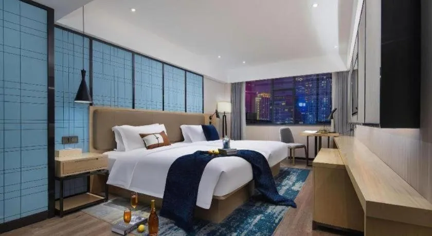 Bed in Echarm Hotel Changchun Jiutai District Government Railway Station