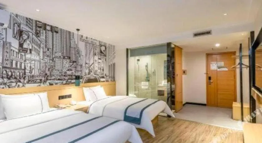 Bed in City Comfort Inn Yulin Youth Square 1st People's Hospital