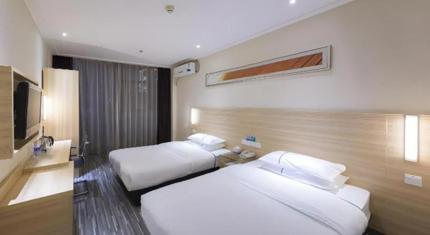 Bed in City Comfort Inn Wuhan Dream Times Baotong Temple Metro Station