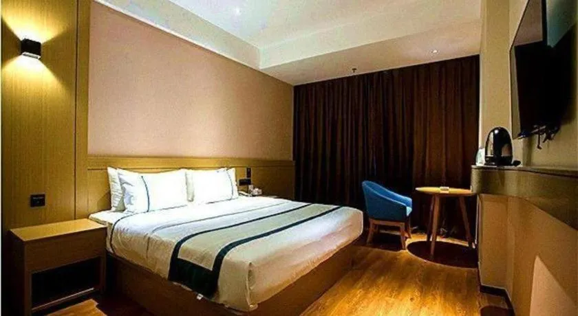 Bed in City Comfort Inn Zhanjiang Middle Haibin Avenue Wanda Plaza