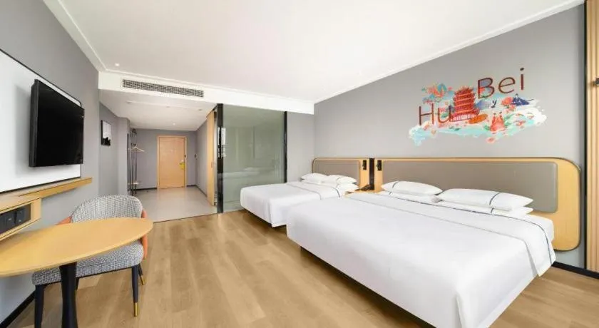 Bed in City Comfort Inn Huangshi Yangxin Mingyuewan Park