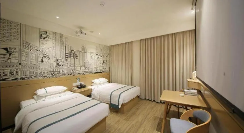 Bed in City Comfort Inn Huangshi Yangxin Mingyuewan Park