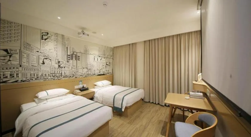 Bed in City Comfort Inn Huangshi Yangxin Mingyuewan Park