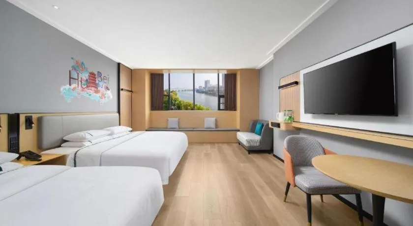 Bed in City Comfort Inn Huangshi Yangxin Mingyuewan Park
