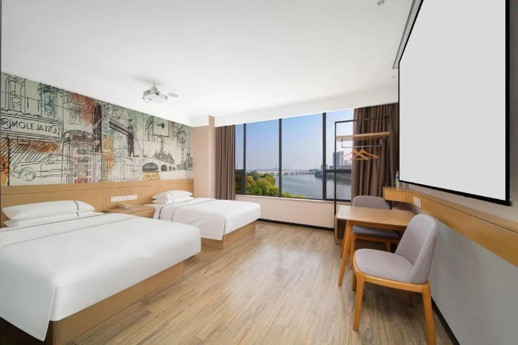 Bed in City Comfort Inn Huangshi Yangxin Mingyuewan Park