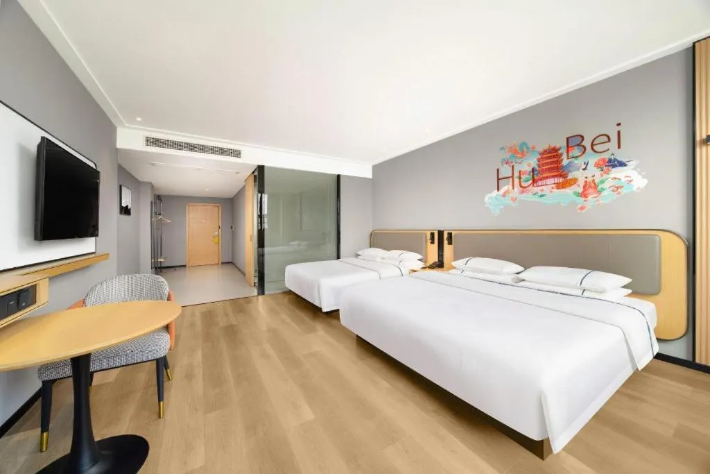 Bed in City Comfort Inn Huangshi Yangxin Mingyuewan Park