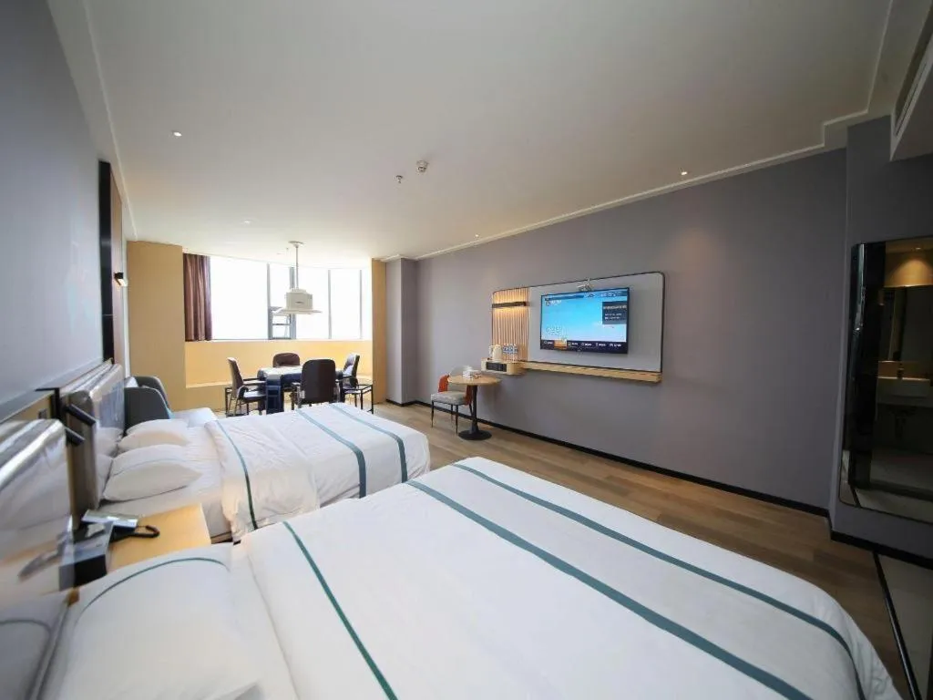 Bed in City Comfort Inn Huangshi Yangxin Mingyuewan Park