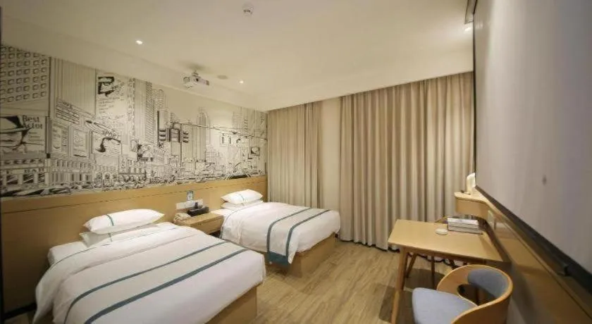 Bed in City Comfort Inn Huangshi Yangxin Mingyuewan Park