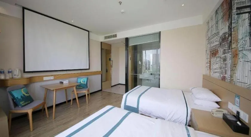 Bed in City Comfort Inn Huangshi Yangxin Mingyuewan Park