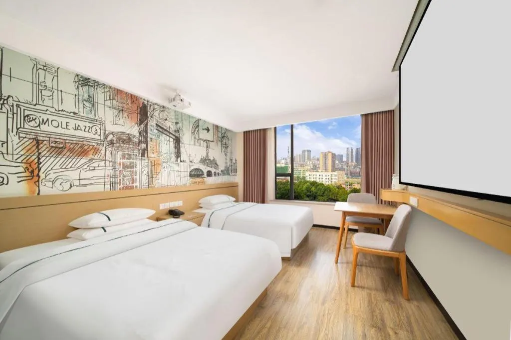 Bed in City Comfort Inn Huangshi Yangxin Mingyuewan Park