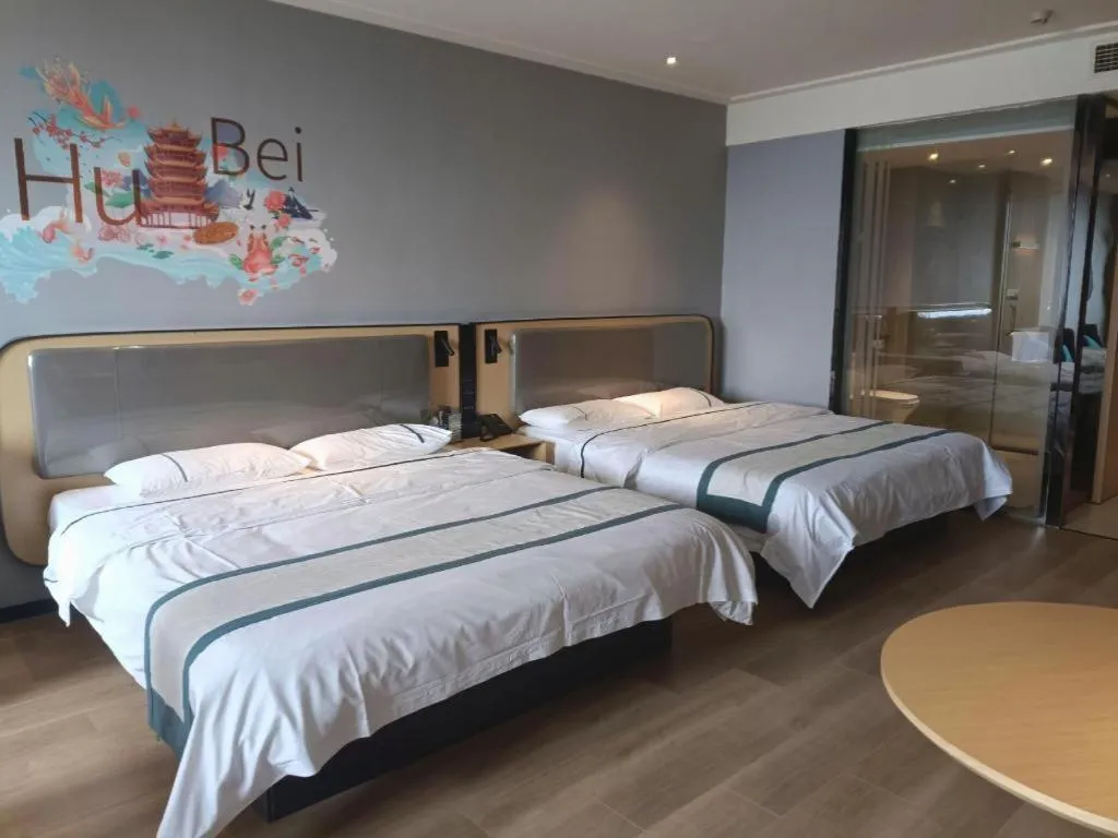 Bed in City Comfort Inn Huangshi Yangxin Mingyuewan Park