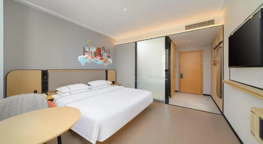 Bed in City Comfort Inn Huangshi Yangxin Mingyuewan Park