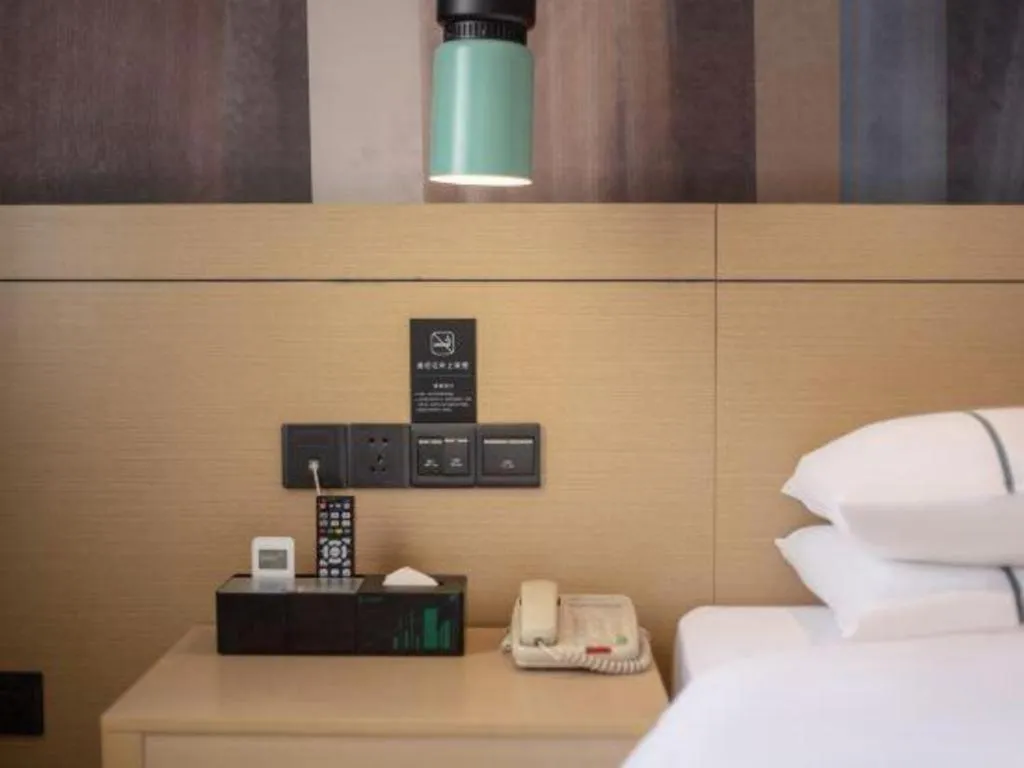 Bed in City Comfort Inn Liuzhou Gubu Street Ma'anshan Park