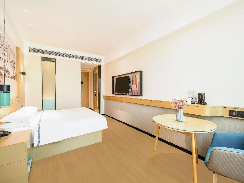 Bed in City Comfort Inn Zhaoqing Qixingyan Yihua Plaza Agile City