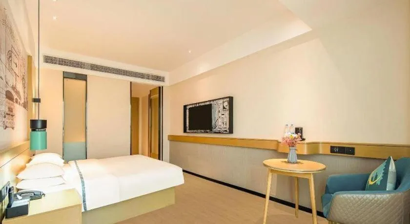 Bed in City Comfort Inn Zhaoqing Qixingyan Yihua Plaza Agile City