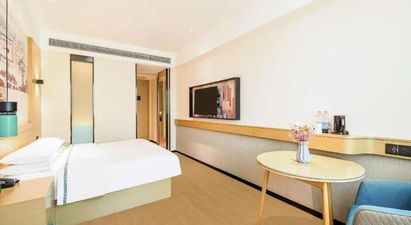 Bed in City Comfort Inn Zhaoqing Qixingyan Yihua Plaza Agile City