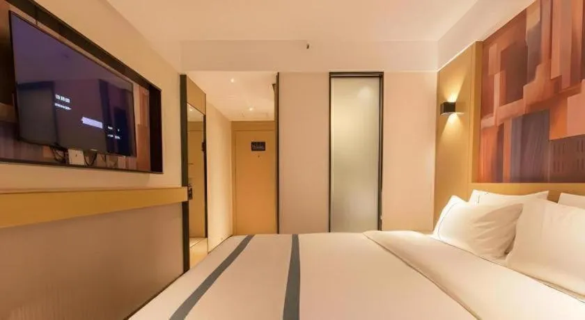 Bed in City Comfort Inn Wuhan International Expo Center Yongwang