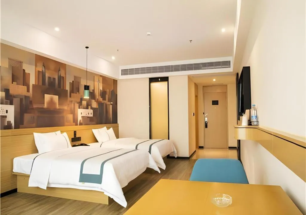 Bed in City Comfort Inn Maoming Xinyi Donghuicheng