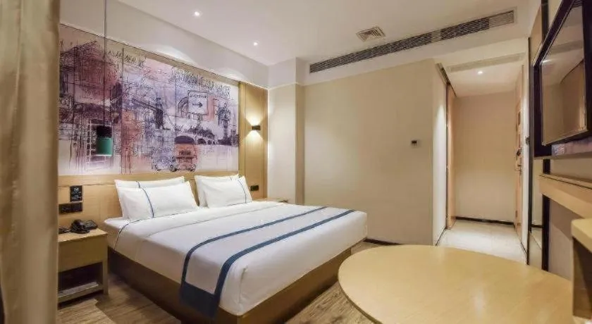 Bed in City Comfort Inn Dongguan Gaobu Avenue