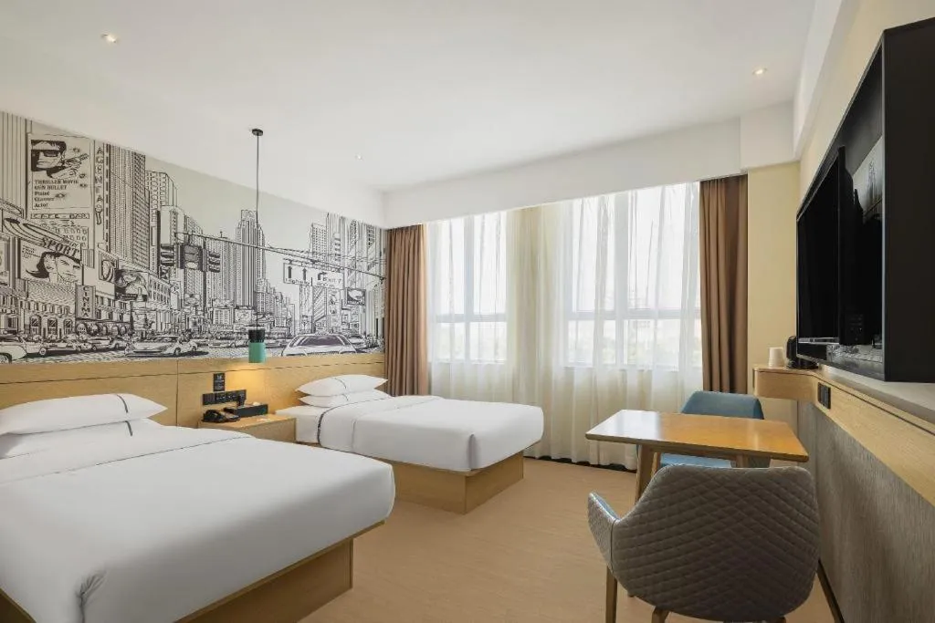 Bed in City Comfort Inn Dongguan Gaobu Avenue