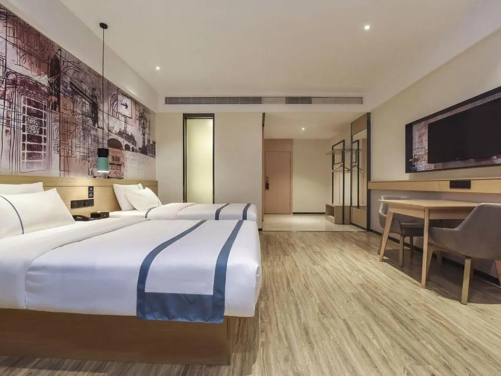 Bed in City Comfort Inn Dongguan Gaobu Avenue