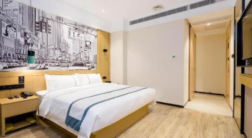 Bed in City Comfort Inn Dongguan Gaobu Avenue