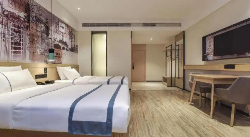 Bed in City Comfort Inn Dongguan Gaobu Avenue