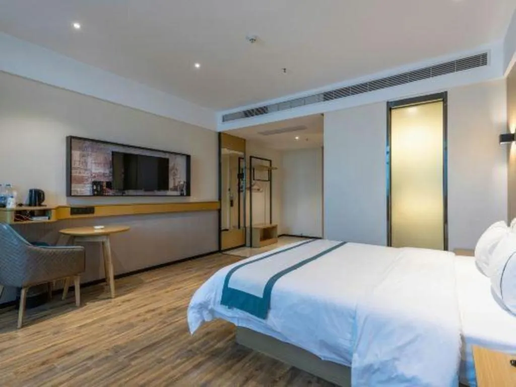 Bed in City Comfort Inn Dongguan Gaobu Avenue