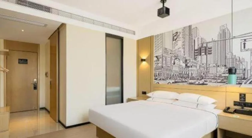 Bed in City Comfort Inn Dongguan Gaobu Avenue