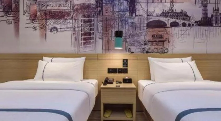 Bed in City Comfort Inn Dongguan Gaobu Avenue