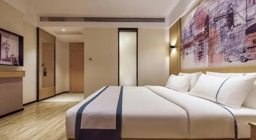 Bed in City Comfort Inn Dongguan Gaobu Avenue