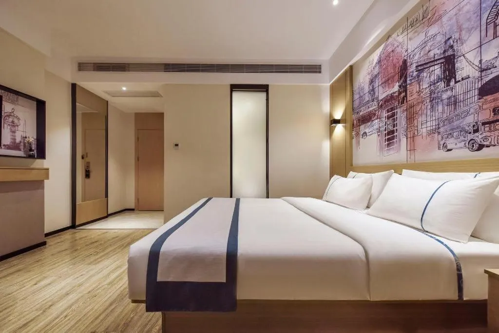 Bed in City Comfort Inn Dongguan Gaobu Avenue
