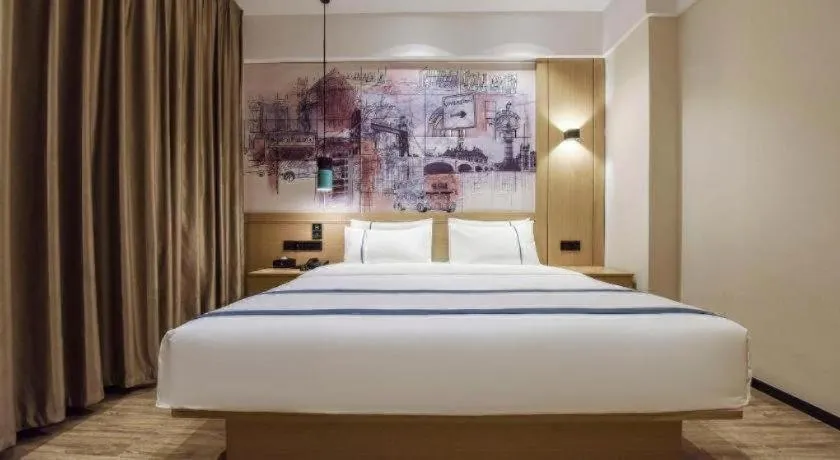 Bed in City Comfort Inn Dongguan Gaobu Avenue
