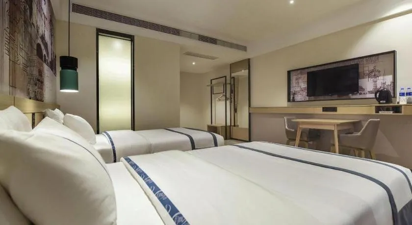 Bed in City Comfort Inn Dongguan Gaobu Avenue