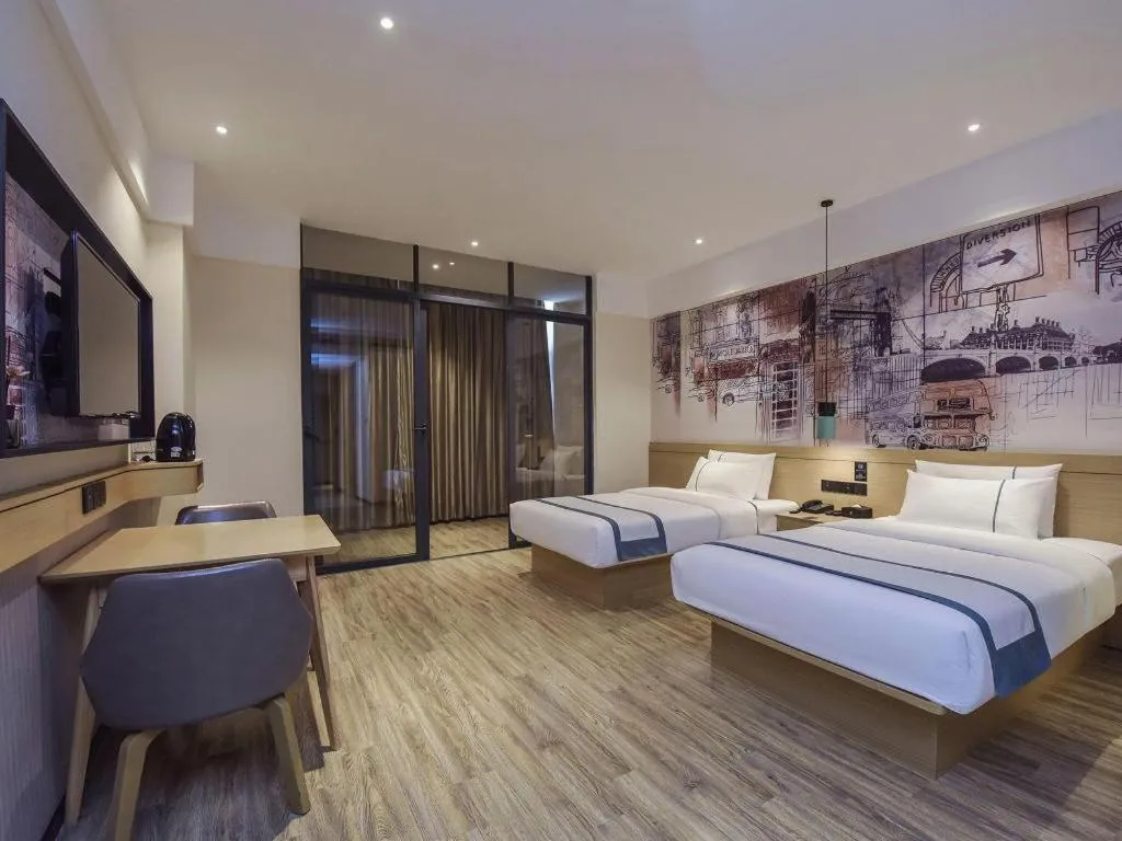 Bed in City Comfort Inn Dongguan Gaobu Avenue