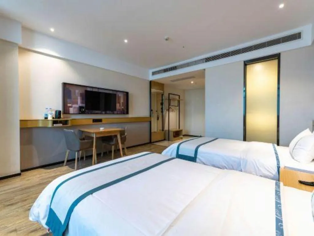 Bed in City Comfort Inn Dongguan Gaobu Avenue