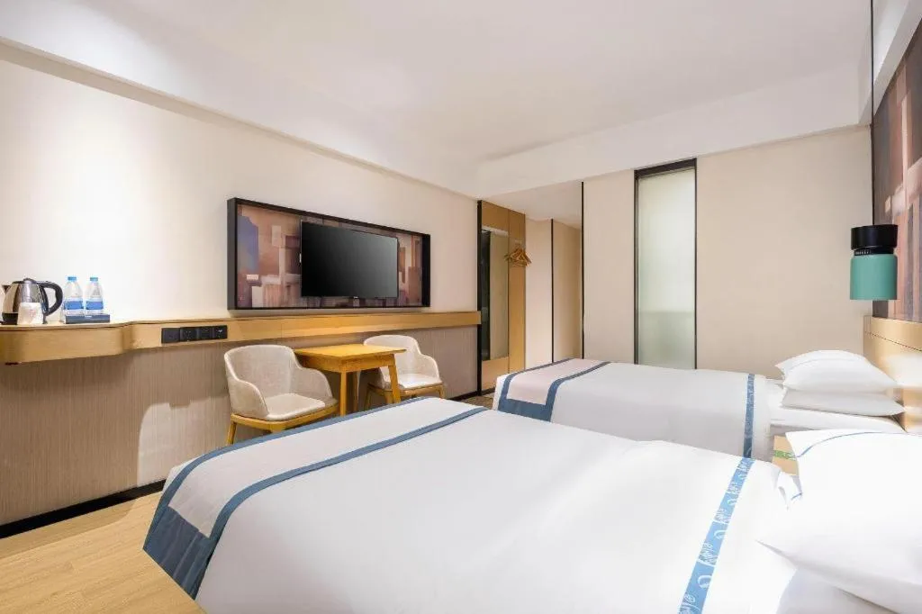 Bed in City Comfort Inn Dongfang Donghai Road Gymnasium Municipal Government