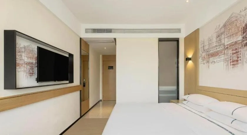 Bed in City Comfort Inn Dongfang Donghai Road Gymnasium Municipal Government