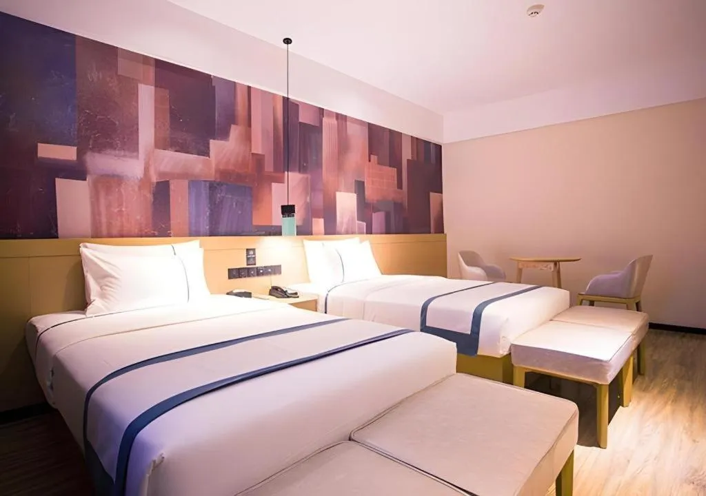 Bed in City Comfort Inn Dongfang Donghai Road Gymnasium Municipal Government