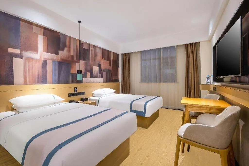 Bed in City Comfort Inn Dongfang Donghai Road Gymnasium Municipal Government